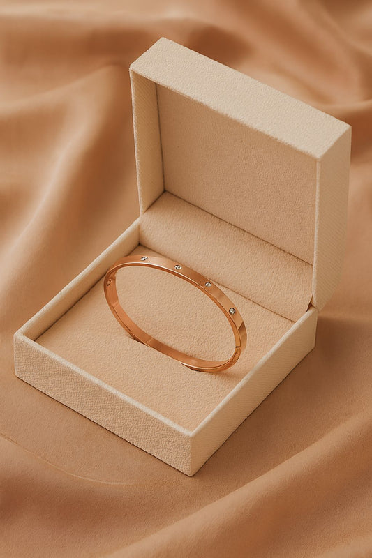 A. BRACCIALE RIGIDO ORO ROSA 009