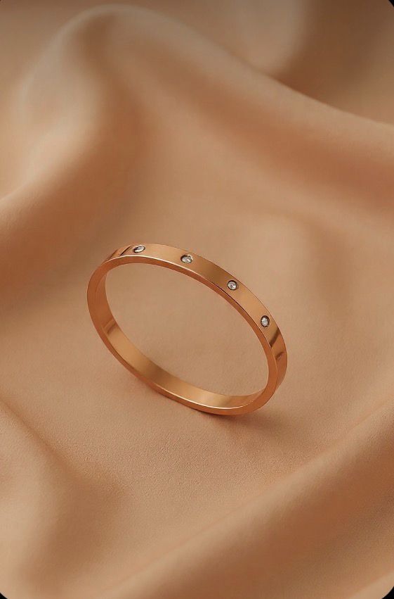 A. BRACCIALE RIGIDO ORO ROSA 009